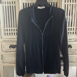 This is a beautiful silk jacket in new condition by Stella McCartney.